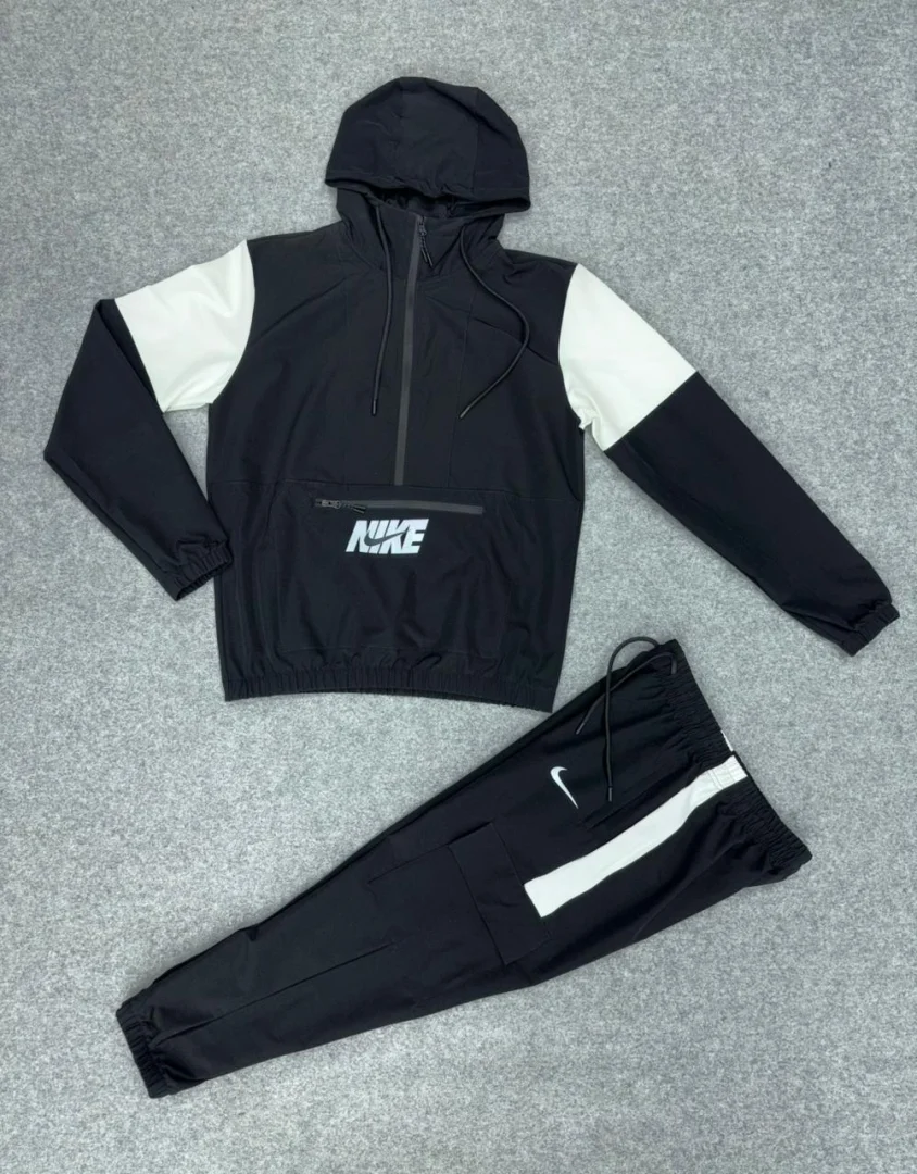 CONJUNTO NIKE ROMPEVIENTO