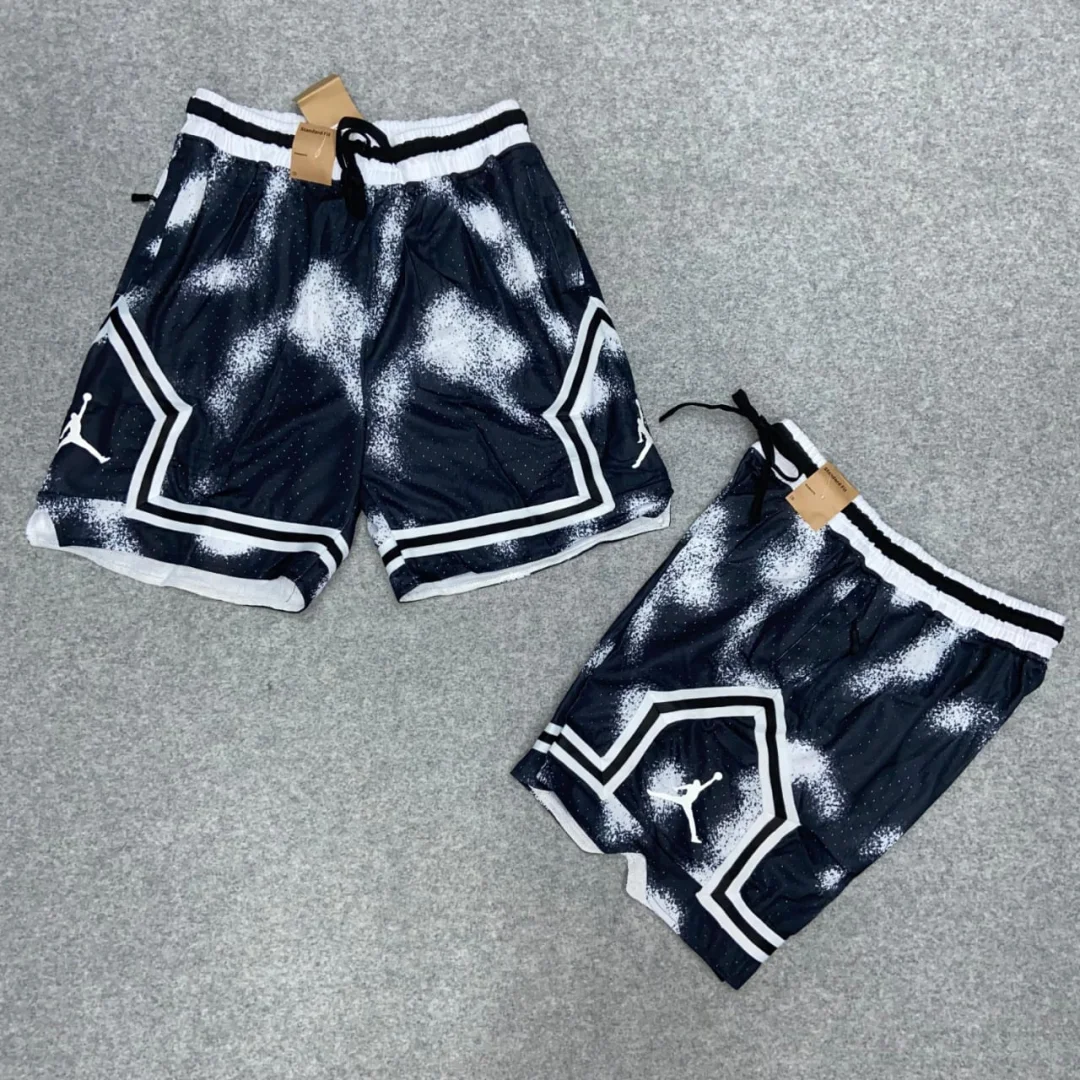 SHORT JORDAN 23 GASPEADO NEGRO Y BLANCO