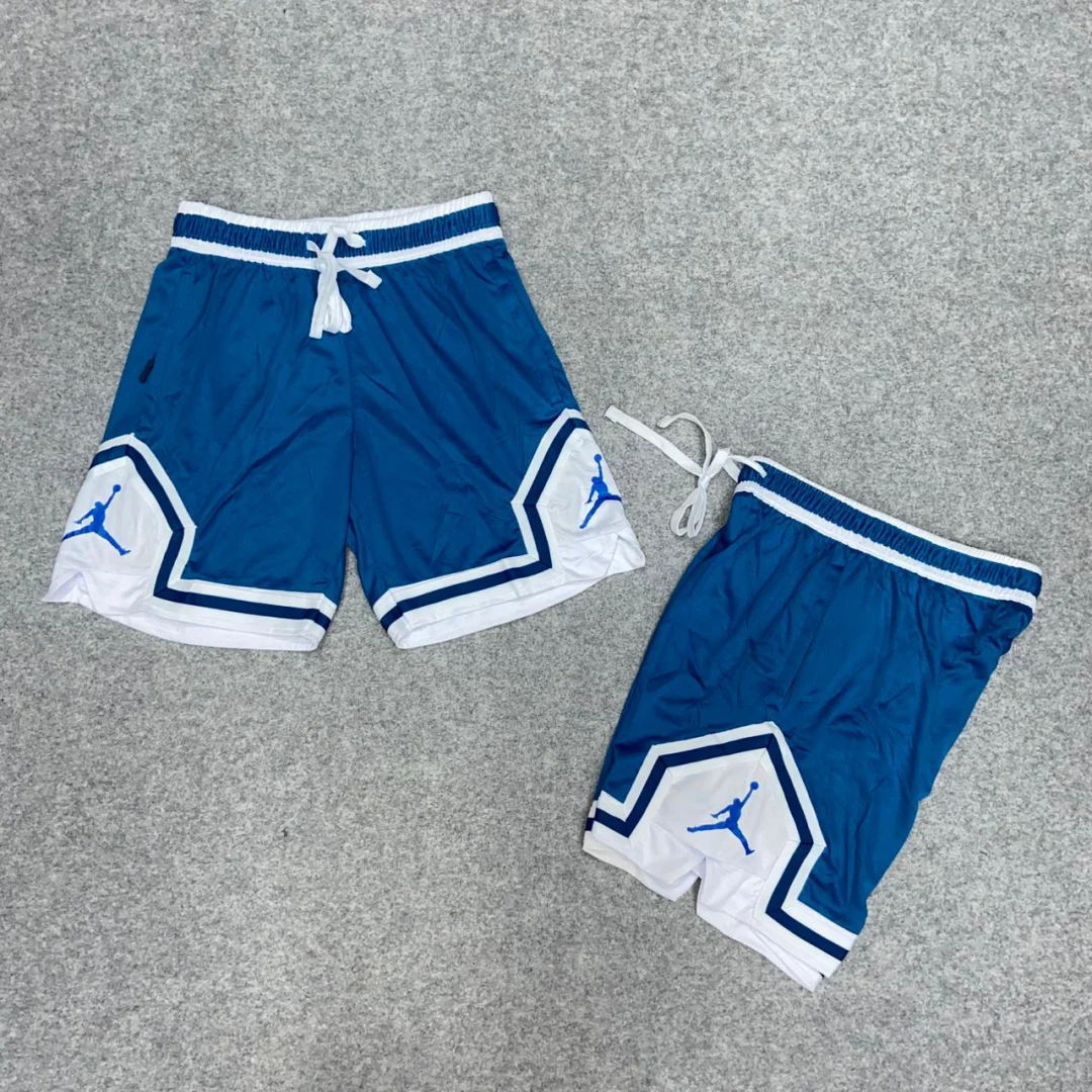 SHORT JORDAN 23 LISO TURQUESA