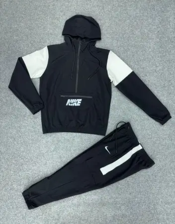 CONJUNTO NIKE ROMPEVIENTO