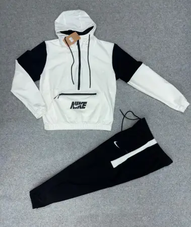 CONJUNTO NIKE ROMPEVIENTO
