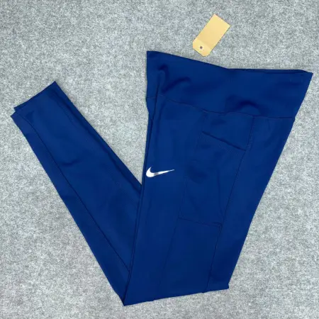 CALZA LARGA NIKE CON BOLSILLO LATERAL